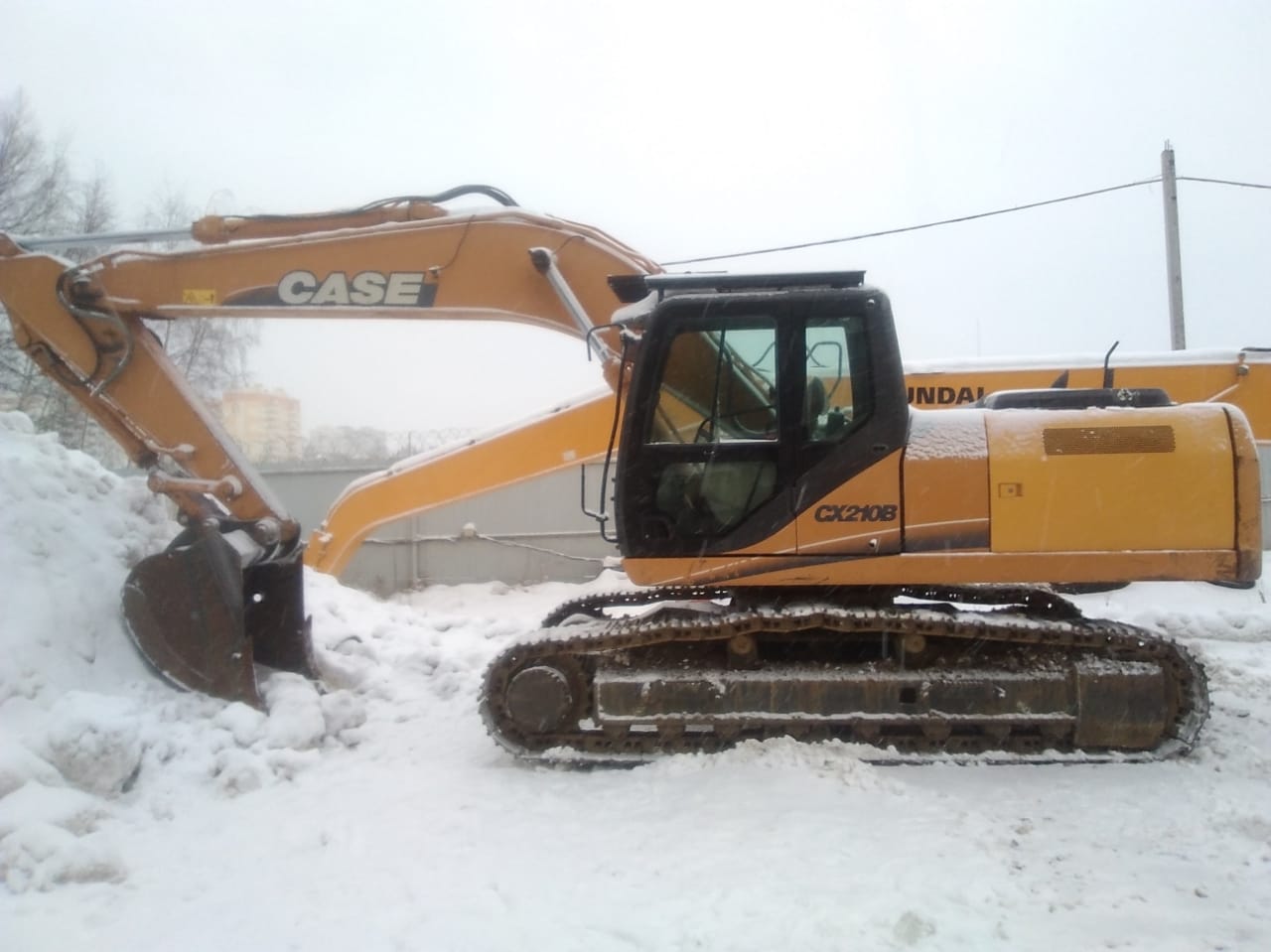 Экскаватор гусеничный CASE CX210B NLC габарит б/у (2012 г.,1100 мч.) 