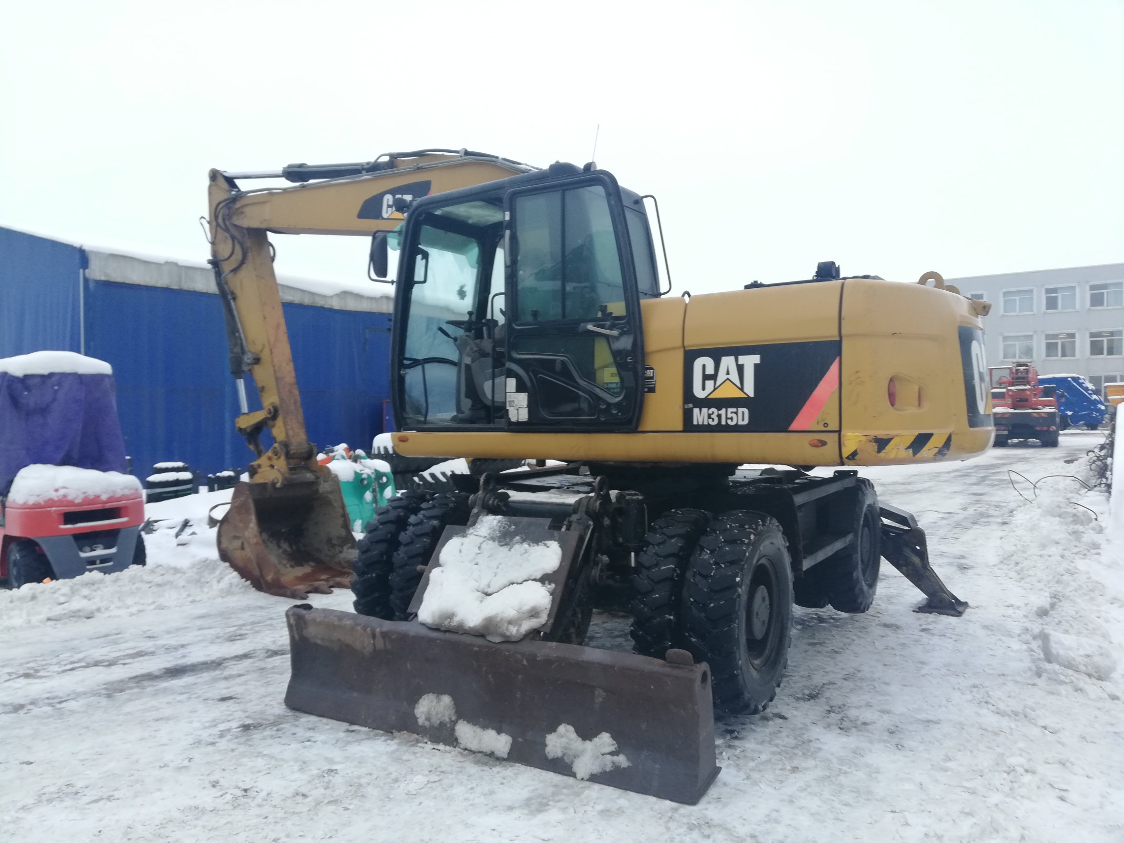  Колесный экскаватор Caterpillar M315D б/у (2012г.в.,9450м.ч.)